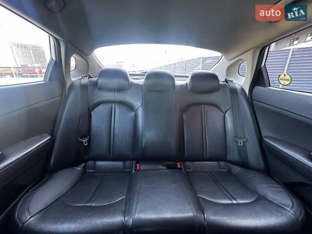 Серый Киа K5, объемом двигателя 2 л и пробегом 342 тыс. км за 9500 $, фото 11 на Automoto.ua