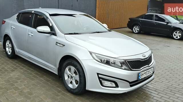 Серый Киа K5, объемом двигателя 2 л и пробегом 270 тыс. км за 8800 $, фото 1 на Automoto.ua