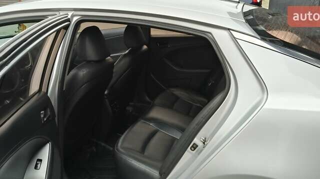 Серый Киа K5, объемом двигателя 2 л и пробегом 270 тыс. км за 8800 $, фото 12 на Automoto.ua