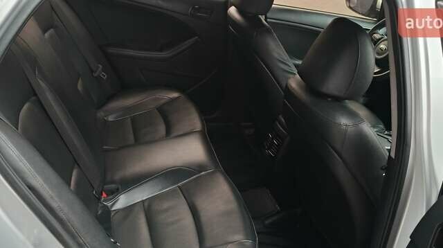 Серый Киа K5, объемом двигателя 2 л и пробегом 270 тыс. км за 8800 $, фото 14 на Automoto.ua