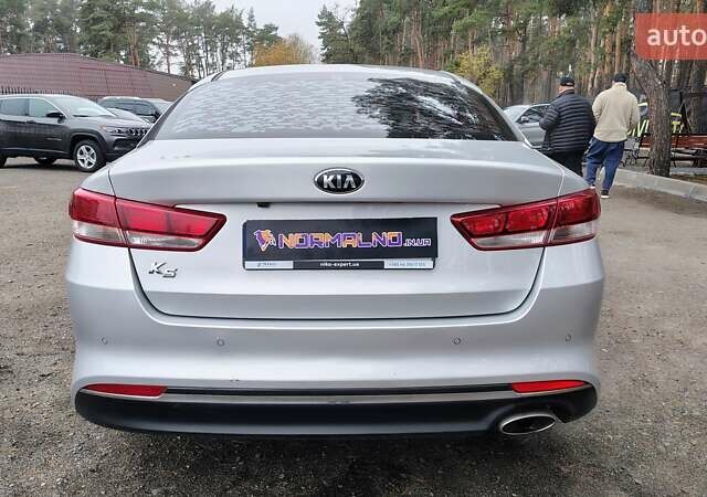 Серый Киа K5, объемом двигателя 2 л и пробегом 314 тыс. км за 10000 $, фото 5 на Automoto.ua