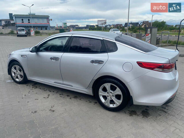 Серый Киа K5, объемом двигателя 2 л и пробегом 338 тыс. км за 12000 $, фото 5 на Automoto.ua