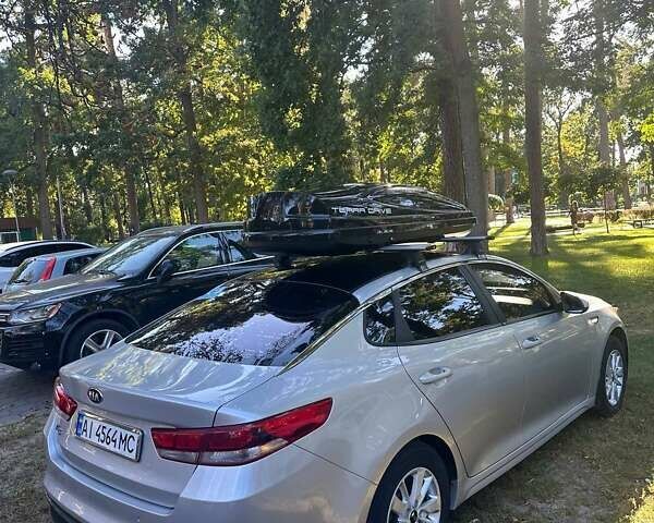 Серый Киа K5, объемом двигателя 2 л и пробегом 168 тыс. км за 11500 $, фото 1 на Automoto.ua