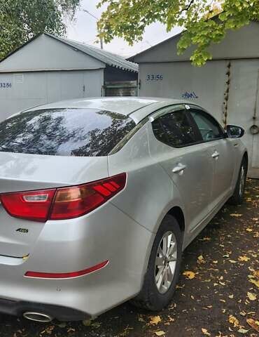 Серый Киа K5, объемом двигателя 2 л и пробегом 207 тыс. км за 8500 $, фото 5 на Automoto.ua