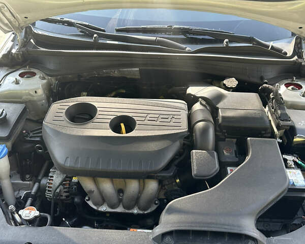 Серый Киа K5, объемом двигателя 2 л и пробегом 215 тыс. км за 11500 $, фото 20 на Automoto.ua