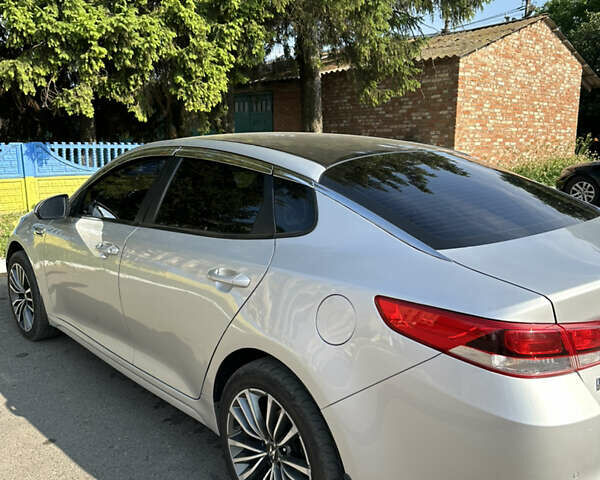 Серый Киа K5, объемом двигателя 2 л и пробегом 215 тыс. км за 11500 $, фото 15 на Automoto.ua