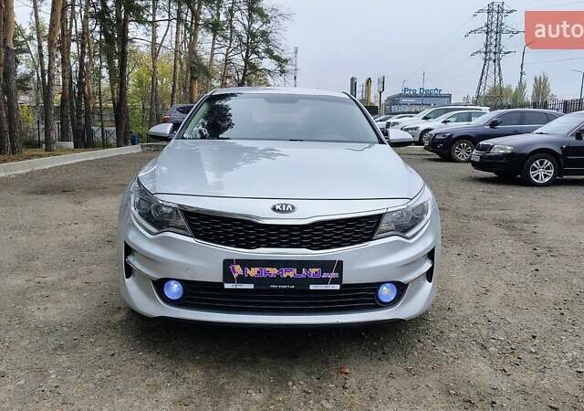 Серый Киа K5, объемом двигателя 2 л и пробегом 314 тыс. км за 10000 $, фото 1 на Automoto.ua