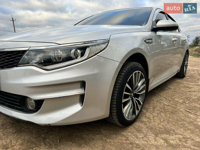 Серый Киа K5, объемом двигателя 2 л и пробегом 215 тыс. км за 11500 $, фото 1 на Automoto.ua