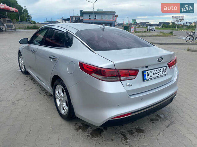 Серый Киа K5, объемом двигателя 2 л и пробегом 338 тыс. км за 12000 $, фото 7 на Automoto.ua