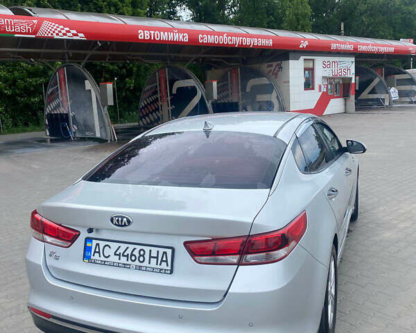 Серый Киа K5, объемом двигателя 2 л и пробегом 338 тыс. км за 12000 $, фото 6 на Automoto.ua