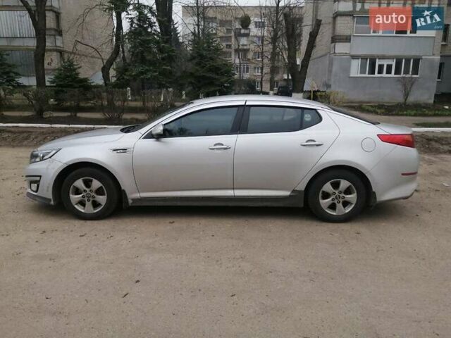 Серый Киа K5, объемом двигателя 2 л и пробегом 257 тыс. км за 8500 $, фото 1 на Automoto.ua