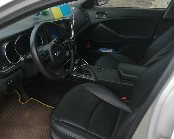 Серый Киа K5, объемом двигателя 2 л и пробегом 257 тыс. км за 8500 $, фото 3 на Automoto.ua