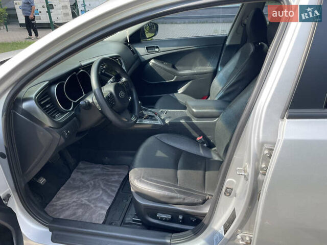 Серый Киа K5, объемом двигателя 2 л и пробегом 236 тыс. км за 10500 $, фото 11 на Automoto.ua