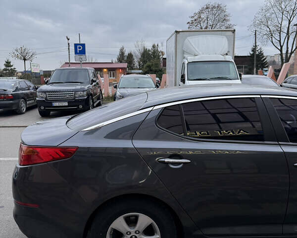 Серый Киа K5, объемом двигателя 2 л и пробегом 240 тыс. км за 11400 $, фото 13 на Automoto.ua