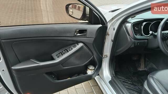 Серый Киа K5, объемом двигателя 2 л и пробегом 270 тыс. км за 8800 $, фото 7 на Automoto.ua