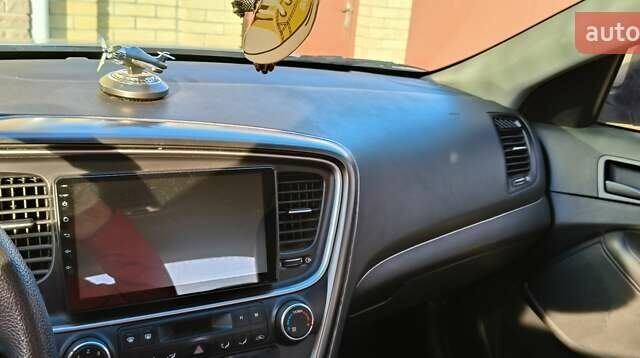 Серый Киа K5, объемом двигателя 2 л и пробегом 270 тыс. км за 8900 $, фото 7 на Automoto.ua