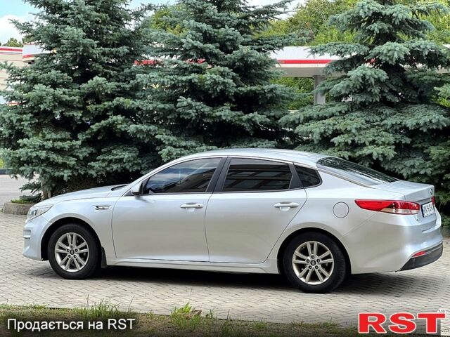 Серый Киа K5, объемом двигателя 2 л и пробегом 200 тыс. км за 9600 $, фото 7 на Automoto.ua