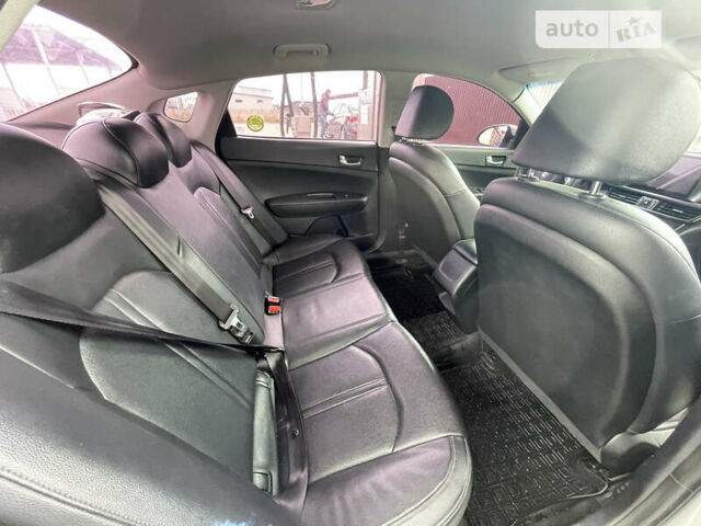 Серый Киа K5, объемом двигателя 2 л и пробегом 136 тыс. км за 11500 $, фото 8 на Automoto.ua