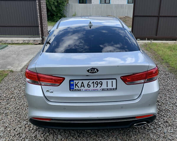 Серый Киа K5, объемом двигателя 2 л и пробегом 157 тыс. км за 11900 $, фото 22 на Automoto.ua