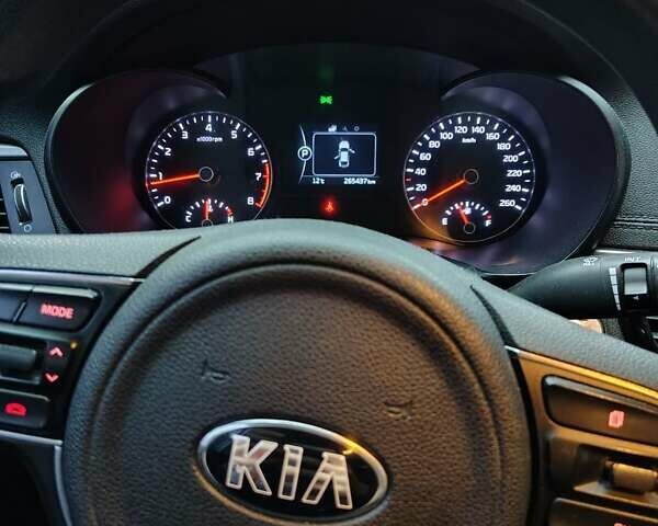 Сірий Кіа K5, об'ємом двигуна 2 л та пробігом 265 тис. км за 10999 $, фото 1 на Automoto.ua