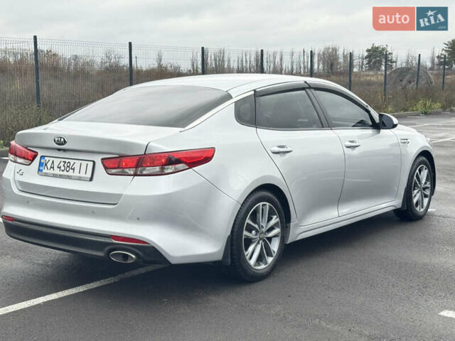 Серый Киа K5, объемом двигателя 2 л и пробегом 307 тыс. км за 8950 $, фото 4 на Automoto.ua