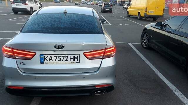 Серый Киа K5, объемом двигателя 2 л и пробегом 290 тыс. км за 12000 $, фото 22 на Automoto.ua