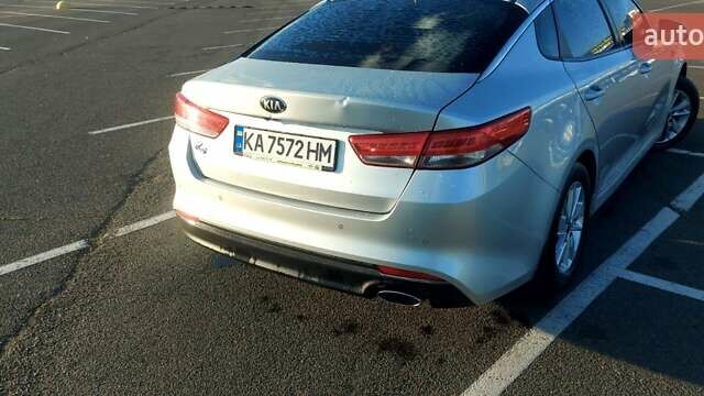 Серый Киа K5, объемом двигателя 2 л и пробегом 290 тыс. км за 12000 $, фото 6 на Automoto.ua