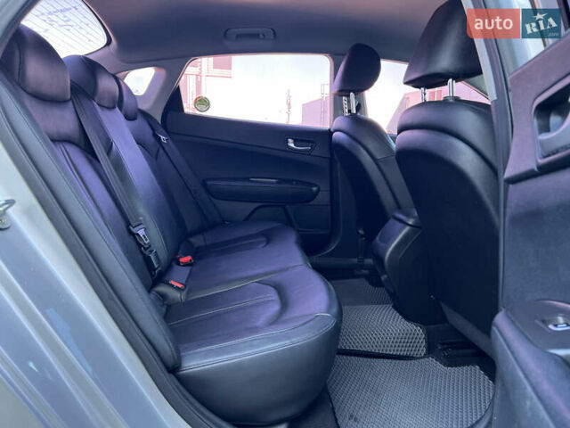 Серый Киа K5, объемом двигателя 2 л и пробегом 240 тыс. км за 12500 $, фото 25 на Automoto.ua