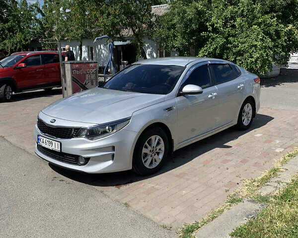 Серый Киа K5, объемом двигателя 2 л и пробегом 157 тыс. км за 11900 $, фото 10 на Automoto.ua