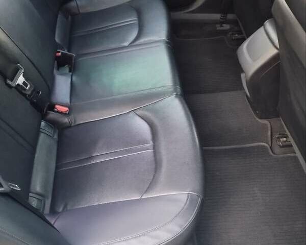 Серый Киа K5, объемом двигателя 2 л и пробегом 355 тыс. км за 10800 $, фото 11 на Automoto.ua