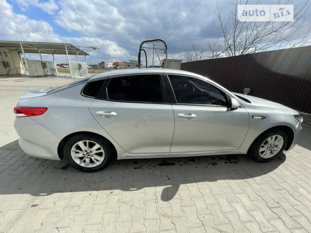 Серый Киа K5, объемом двигателя 2 л и пробегом 136 тыс. км за 11500 $, фото 6 на Automoto.ua