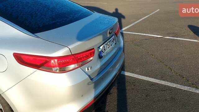 Серый Киа K5, объемом двигателя 2 л и пробегом 290 тыс. км за 12000 $, фото 5 на Automoto.ua