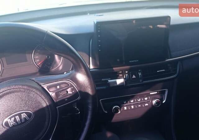 Серый Киа K5, объемом двигателя 2 л и пробегом 117 тыс. км за 14900 $, фото 66 на Automoto.ua