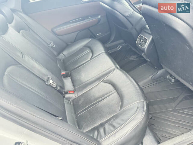 Серый Киа K5, объемом двигателя 2 л и пробегом 307 тыс. км за 8950 $, фото 11 на Automoto.ua