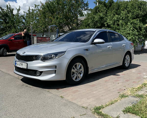 Серый Киа K5, объемом двигателя 2 л и пробегом 157 тыс. км за 11900 $, фото 11 на Automoto.ua