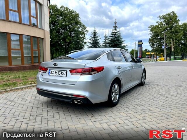 Серый Киа K5, объемом двигателя 2 л и пробегом 200 тыс. км за 9600 $, фото 4 на Automoto.ua