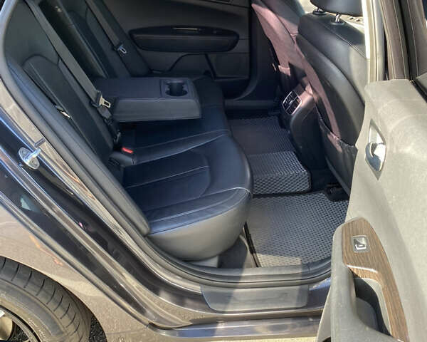 Серый Киа K5, объемом двигателя 2 л и пробегом 380 тыс. км за 13900 $, фото 12 на Automoto.ua