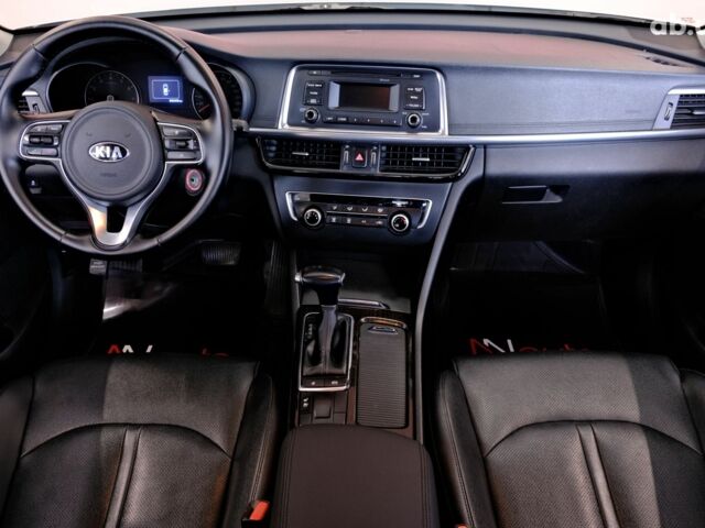Серый Киа K5, объемом двигателя 2 л и пробегом 296 тыс. км за 7900 $, фото 6 на Automoto.ua