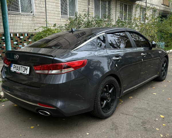 Сірий Кіа K5, об'ємом двигуна 2 л та пробігом 210 тис. км за 13100 $, фото 2 на Automoto.ua