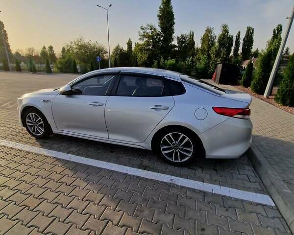 Серый Киа K5, объемом двигателя 2 л и пробегом 285 тыс. км за 13000 $, фото 3 на Automoto.ua