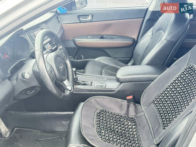 Серый Киа K5, объемом двигателя 2 л и пробегом 307 тыс. км за 8950 $, фото 8 на Automoto.ua
