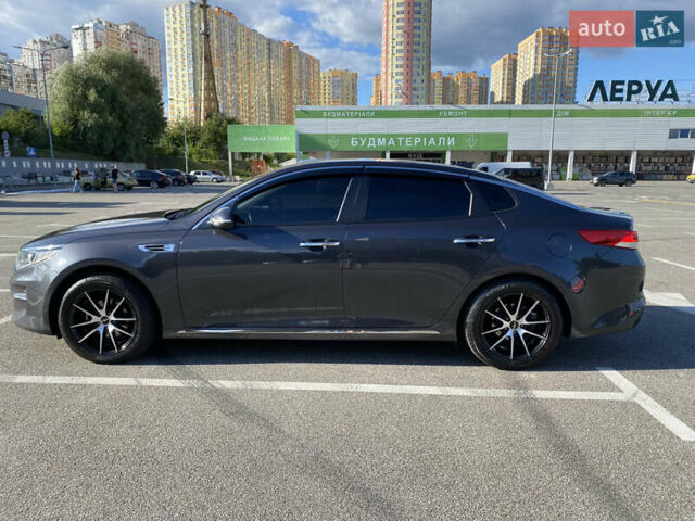 Серый Киа K5, объемом двигателя 2 л и пробегом 380 тыс. км за 13900 $, фото 4 на Automoto.ua