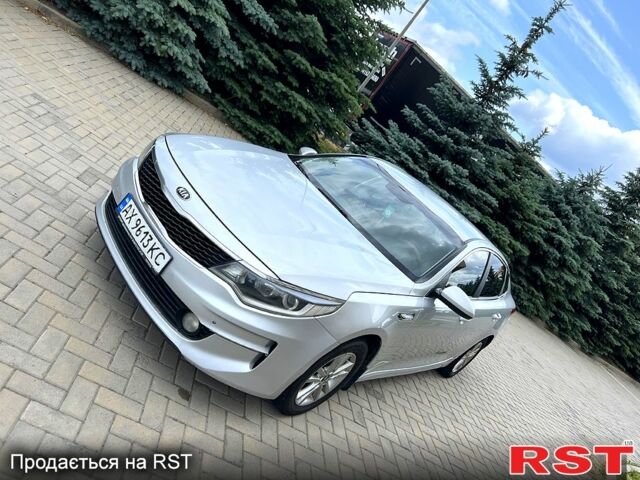 Серый Киа K5, объемом двигателя 2 л и пробегом 200 тыс. км за 9600 $, фото 1 на Automoto.ua