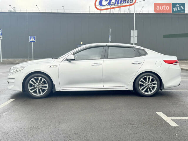 Серый Киа K5, объемом двигателя 2 л и пробегом 307 тыс. км за 8950 $, фото 7 на Automoto.ua