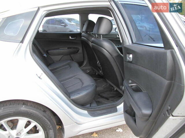 Сірий Кіа K5, об'ємом двигуна 2 л та пробігом 291 тис. км за 12800 $, фото 34 на Automoto.ua