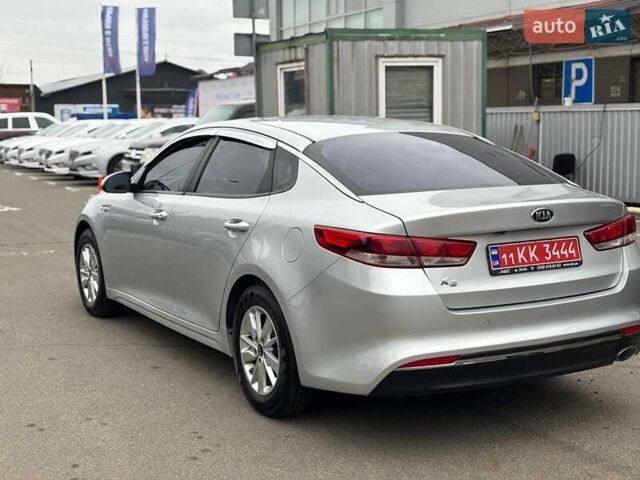 Серый Киа K5, объемом двигателя 2 л и пробегом 244 тыс. км за 11990 $, фото 4 на Automoto.ua