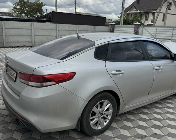 Серый Киа K5, объемом двигателя 2 л и пробегом 130 тыс. км за 4999 $, фото 5 на Automoto.ua