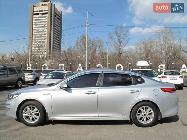 Серый Киа K5, объемом двигателя 2 л и пробегом 309 тыс. км за 11700 $, фото 3 на Automoto.ua