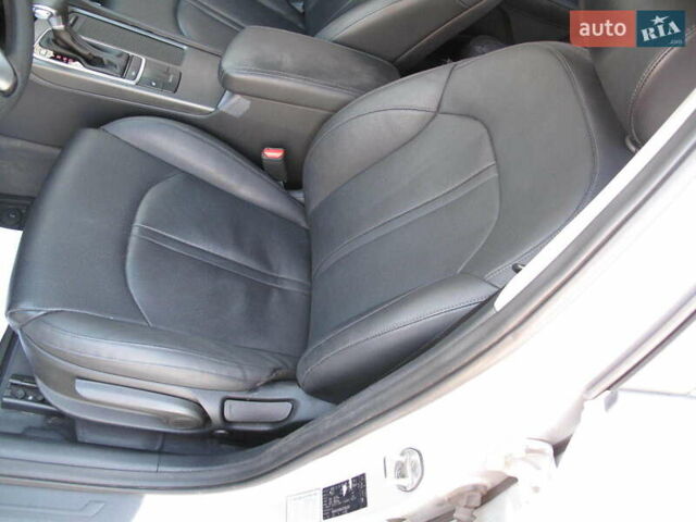 Серый Киа K5, объемом двигателя 2 л и пробегом 309 тыс. км за 11700 $, фото 83 на Automoto.ua