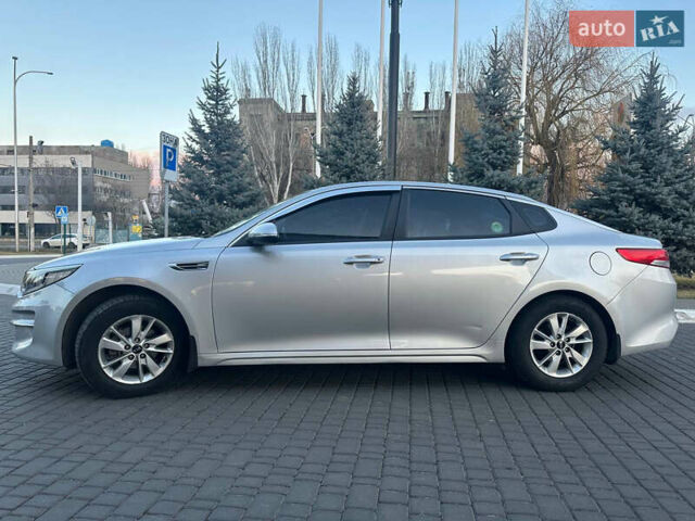 Серый Киа K5, объемом двигателя 2 л и пробегом 292 тыс. км за 11000 $, фото 9 на Automoto.ua